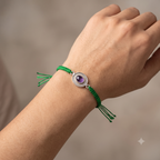 The Karuna Oval Purple Stone Rakhi