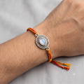 The Karuna Oval serene grey Stone Rakhi