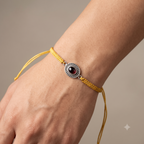 The Karuna Oval Purple Stone Rakhi